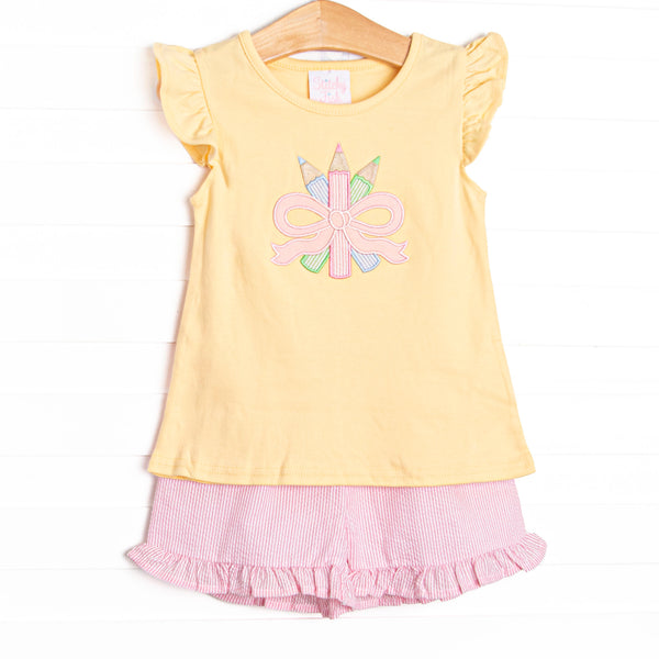 This set features a&nbsp; yellow flutter sleeve top with a colored pencils and bow applique. Coordinating pink seersucker shorts to match.