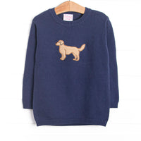 This sweater features a navy blue knit material, a turtleneck, and dog applique.