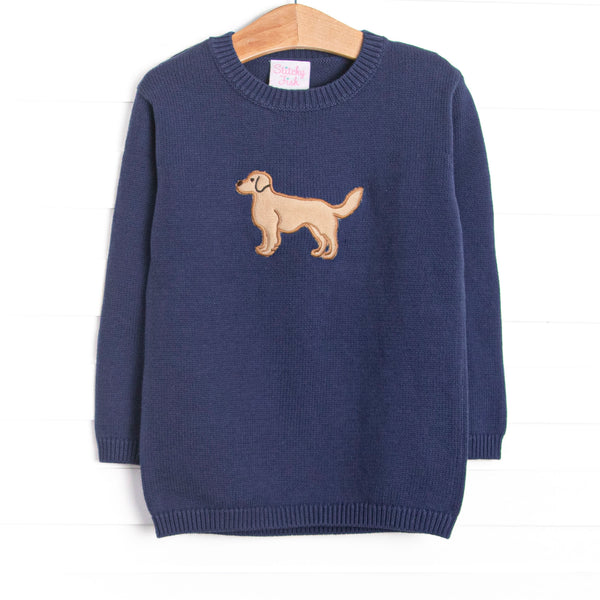 This sweater features a navy blue knit material, a turtleneck, and dog applique.