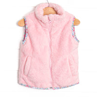 This vest features the softest pink fuzzy fleece, pockets to keep little hands warm, and a full zipper down the front.