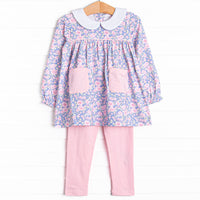 This set features a purple floral top with a peter pan collar and pink front pockets. Coordinating pink leggings to match.