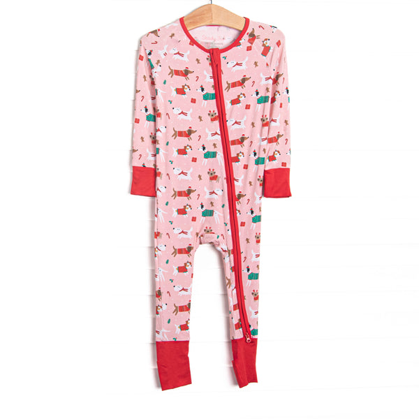 This zippy is made of the extremely soft, stretchy bamboo viscose fabric that feels like butter.&nbsp;With fold over cuffs at the feet so it can be worn as a romper or a&nbsp;zippy, a&nbsp;double zipper for easier diaper changes, and a puppy and presents print