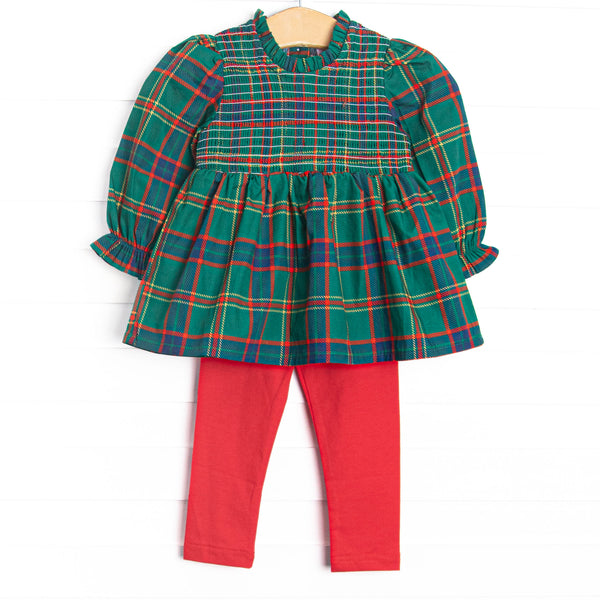  This set features a tartan plaid top with a smocking across the chest, and red leggings to match. 