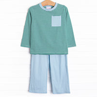  The set features soft knit material, a front pocket, and coordinating blue pants. 