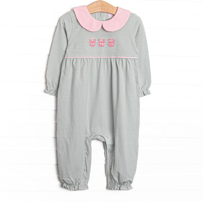 This romper features sage green and white striped fabric, a trio of Christmas ornament embroidery, and a pink Peter Pan collar.