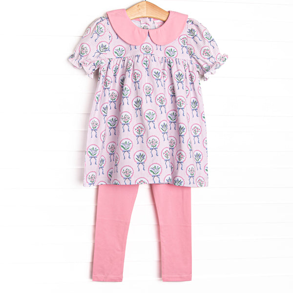  This set features a pink floral print, puff sleeves, and pink peter pan collar. Coordinating pink leggings to match. 