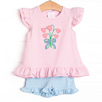 This set features a pink striped flutter sleeve top with a bouquet of flower applique and blue ruffle shorts to match.