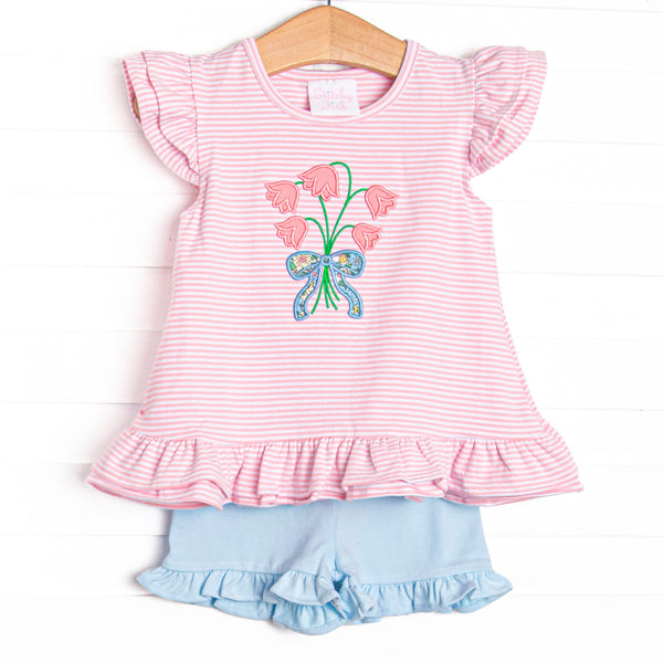 This set features a pink striped flutter sleeve top with a bouquet of flower applique and blue ruffle shorts to match.