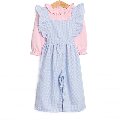 This set features a light blue gingham romper, flutter trim, and a pink ruffle top.&nbsp;