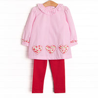  This set features a pink mini gingham print, a ruffle collar, and floral heart appliques. Coordinating red leggings to match. 