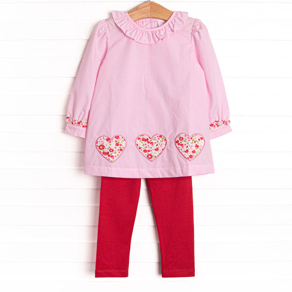  This set features a pink mini gingham print, a ruffle collar, and floral heart appliques. Coordinating red leggings to match. 
