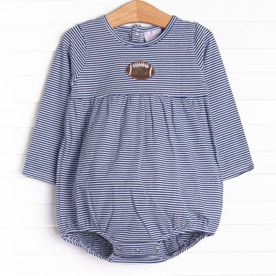 This&nbsp;bubble&nbsp;features a navy striped print, a football embroidery, and snaps on the stride.