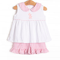 This set features a sleeveless top with gingham collar and a mouse embroidery. Coordinating pink gingham ruffle shorts to match.