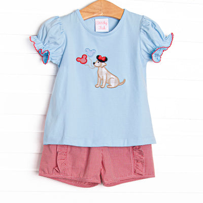  This set features a blue puff sleeve top with a puppy with balloons appliques. Coordinating red gingham ruffle shorts to match. 