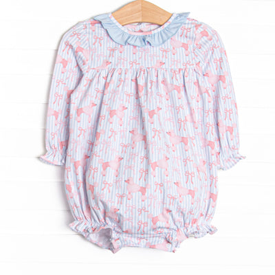 This bubble features blue striped fabric, a pink poodle print, and a blue ruffle collar.