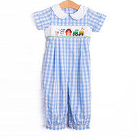 This romper features a blue check material, farm smocking, and a white Peter Pan collar.
