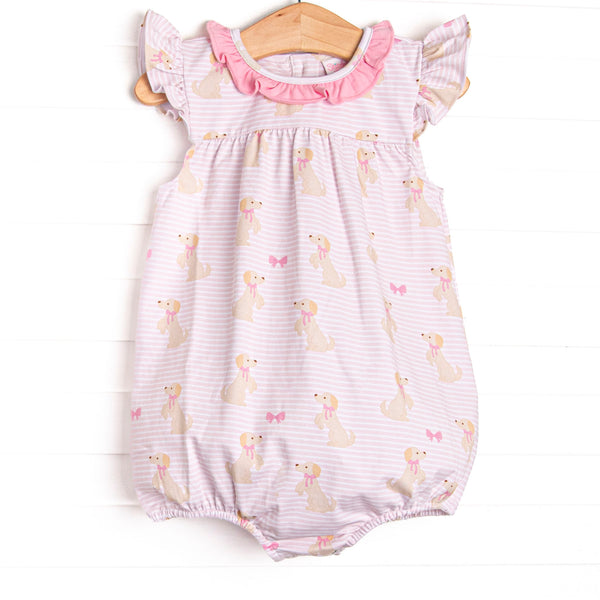 This bubble features a dog printed pink knit fabric, a hot pink ruffle collar, and flutter sleeves.