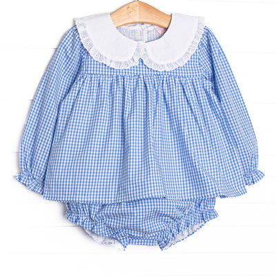 This set features blue gingham fabric, a white eyelet lace trimmed collar, and long sleeves. Coordinating ruffle diaper cover to match.