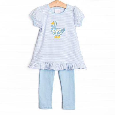 This set features a blue striped knit fabric, goose applique, and short puff sleeves. Coordinating blue leggings to match.