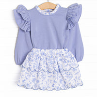 This set features a blue flutter sleeve top with and a blue toile scalloped skirt to match.