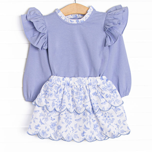 This set features a blue flutter sleeve top with and a blue toile scalloped skirt to match.