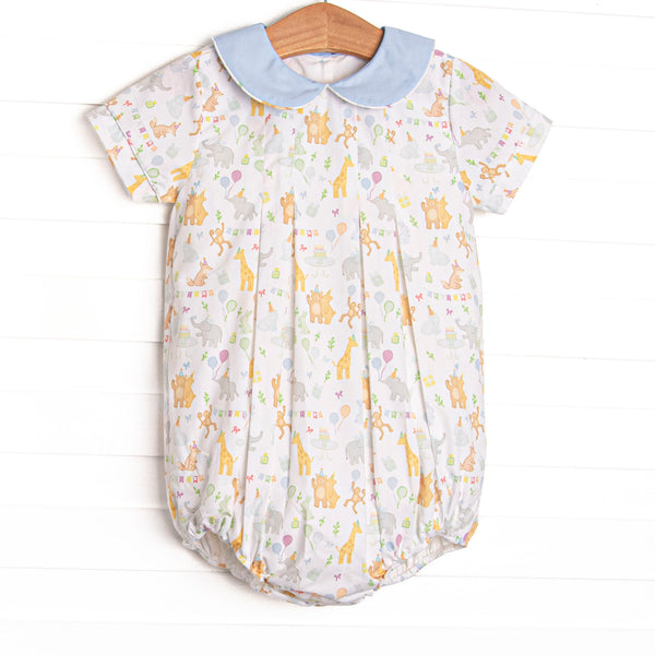  This bubble features a party animal print fabric, a blue Peter Pan collar, and short sleeves. 