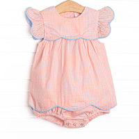  This bubble features a peachy gingham fabric, blue piping, and flutter sleeves. 