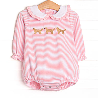 This bubble features pink stripe fabric, golden retriever trio embroidery, and a white Peter Pan collar with pink ruffle trim.