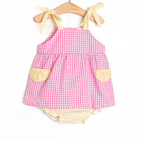 This set features a pink gingham print, yellow seersucker straps, and lemon slice appliques. Coordinating yellow seersucker diaper cover to match.