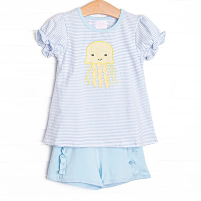 This set features a blue striped top with octopus applique and blue ruffle shorts to match.