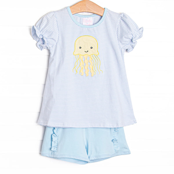This set features a blue striped top with octopus applique and blue ruffle shorts to match.