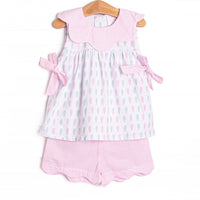 This set features a popsicle print, pink gingham scalloped bib collar, and side bows. Coordinating pink seersucker scalloped shorts to match.