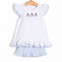  This set features a flutter sleeve top with a trio of sailboat embroidery and blue striped ruffle shorts to match. 