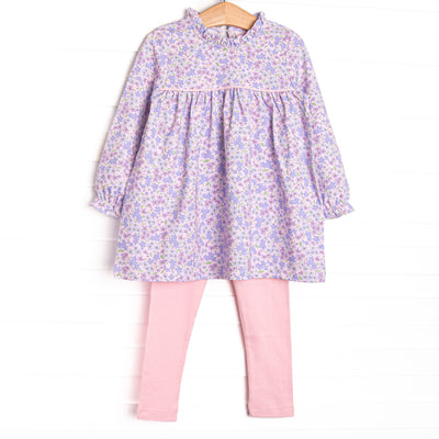 This set features a purple floral top with a ruffle neck detail and pink leggings to match.