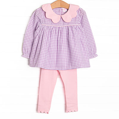 This set features a purple gingham print, pink scalloped peter pan collar, and pink leggings to match.