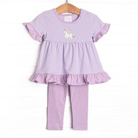 This set features a purple striped puff sleeve top with purple ruffle trim and an unicorn applique. Coordinating purple leggings to match.