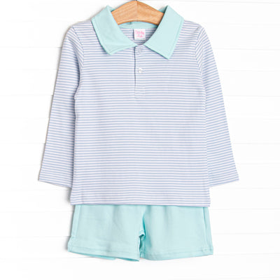 The long sleeve polo shirt boasts a fun, light blue striped front pocket and is perfectly paired with comfy and classic mint green shorts. This precious 100% Pima Cotton set