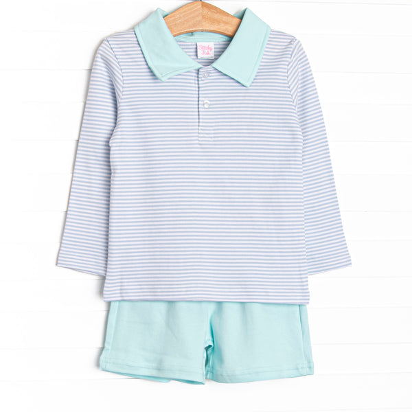 The long sleeve polo shirt boasts a fun, light blue striped front pocket and is perfectly paired with comfy and classic mint green shorts. This precious 100% Pima Cotton set