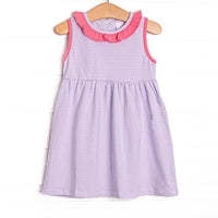The dress&nbsp;features a precious ruffle collar, sweet&nbsp;purple&nbsp;stripes, and soft knit material.