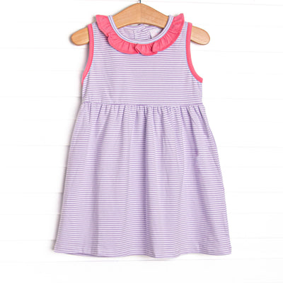 The dress&nbsp;features a precious ruffle collar, sweet&nbsp;purple&nbsp;stripes, and soft knit material.