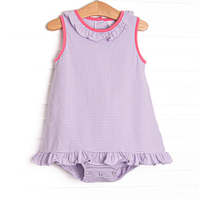 This cozy knit favorite is a staple for every little girl's closet. Featured here in purple stripes with pink ruffles.