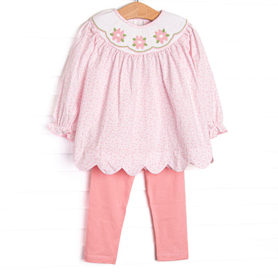 This set features a pink floral printed fabric, long sleeves, a floral smocking plate, and scallop edges. Coordinating leggings to match.