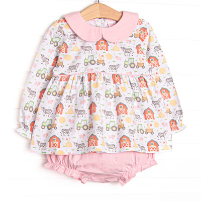  The set features a barnyard print, a pink peter pan collar, and coordinating pink diaper cover to match. 