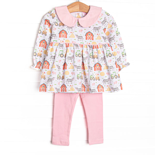  The set features a barnyard print, a pink peter pan collar, and coordinating pink leggings to match. 