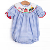 The bubble features a blue plaid print, puff sleeves, and farm smocking.