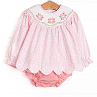 This set features a pink floral printed fabric, long sleeves, a floral smocking plate, and scallop edges. Coordinating diaper cover to match.
