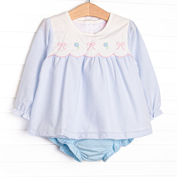 This set features a blue gingham top with a bib collar and bows and flowers appliques. Coordinating blue diaper cover to match.