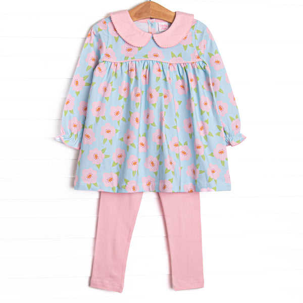This set features a pink and blue floral printed knit fabric, long sleeves, pink piping, and a pink Peter Pan collar. Coordinating leggings to match.