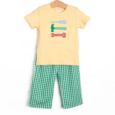 This set features a yellow short sleeve top with a tool trio appliques and green gingham pants to match.