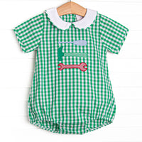 This bubble features a green gingham print, a peter pan collar, and a tool trio appliques.